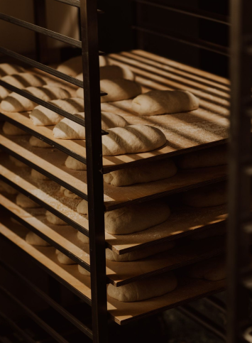 Fresh pastries cooling on an oven rack